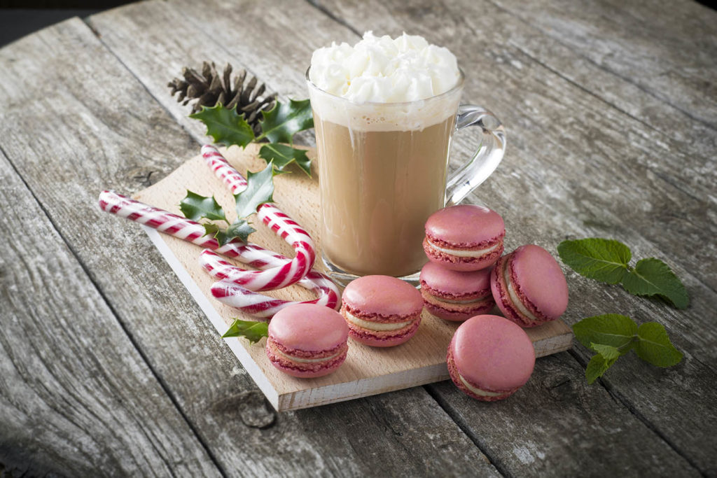 Candy cane macarons with hot chocolate